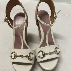 Gucci (slightly off white) wedge. Worn a handful of times.